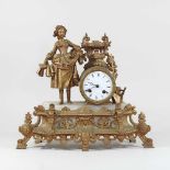 A 19th century gilt metal mounted figural mantel clock