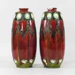 A pair of early 20th century Minton vases