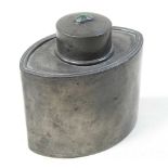 An Arts and Crafts pewter tea caddy by Liberty
