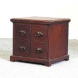 A Victorian walnut table top chest