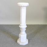 A carved alabaster column