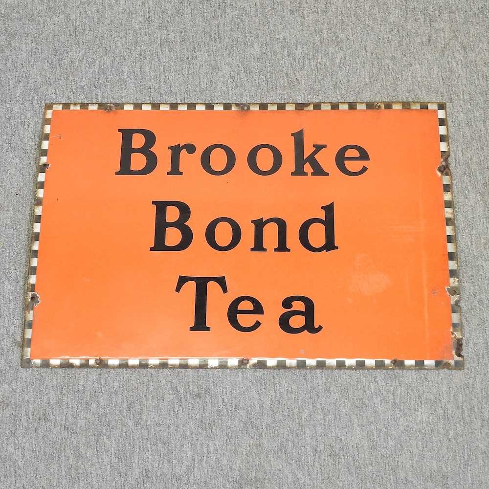 A vintage Brooke Bond Tea enamel advertising sign