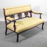An Edwardian inlaid two seater settee