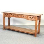 An early 19th century pine dresser base