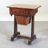 A 19th century rosewood sewing table