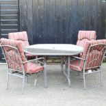 A metal garden table and chairs