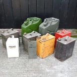 A collection of vintage motor oil cans