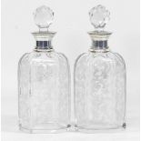 A pair of continental glass decanters