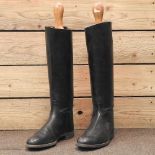 A pair of leather riding boots