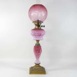 An 19th century French opaline oil lamp