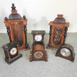 A collection of 19th century and later clocks and cases