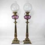 A pair of Victorian style brass oil lamps and shades