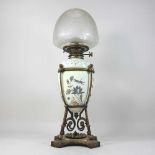 An 19th century opaline and brass oil lamp