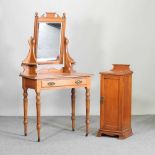 An Edwardian satin walnut dressing table