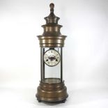 A large brass cased four glass mantel clock