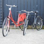 A mid 20th century Dutch red painted bicycle