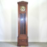 A 1920's oak cased longcase clock