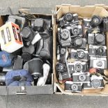 A large collection of vintage cameras
