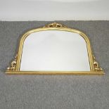 A gilt framed wall mirror