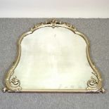 A Victorian style ornate gilt framed over mantel mirror