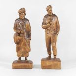 A pair of Black Forest style carved softwood figures