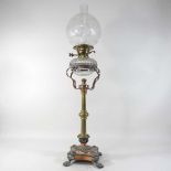 An unusual 19th century brass oil lamp