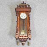 A 19th century mahogany Vienna style wall clock