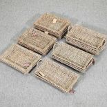 Ten woven seagrass twin handled trays