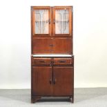 A mid 20th century kitchen cabinet