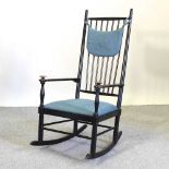 A vintage Swedish ebonised rocking chair