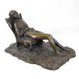 A bronze figure of a nude