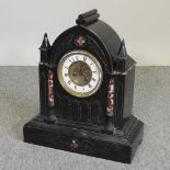 A 19th century slate mantel clock