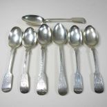 A collection of George III bright cut silver table spoons