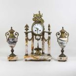 A continental three piece clock garniture