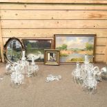A pair of glass wall lights and pictures