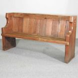 A 19th century carved oak pew