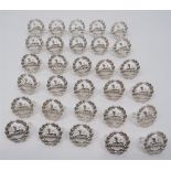 Gloucestershire Silvered Back Cap Badges consisting 30 x small, silvered, regimental back cap badge.