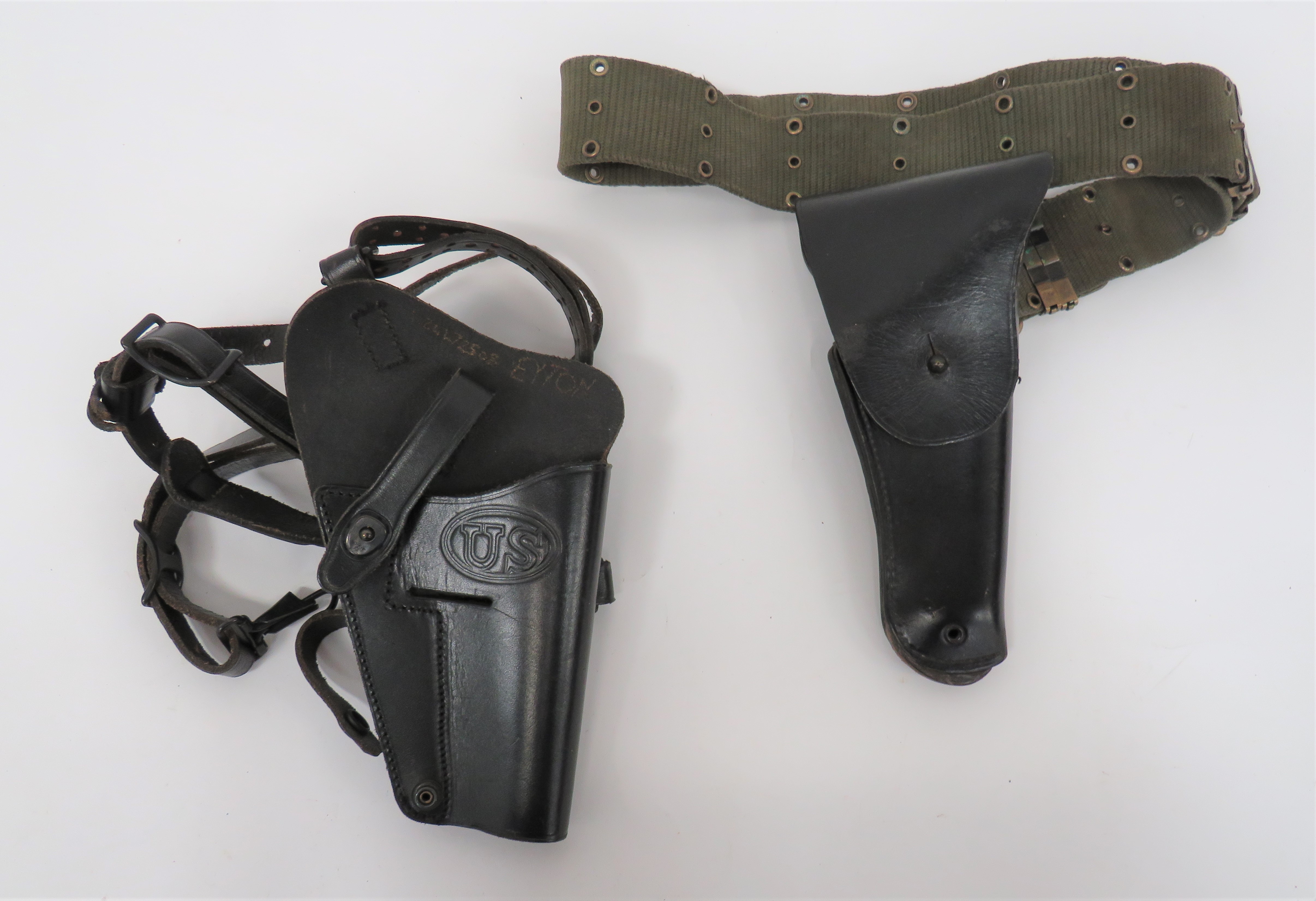 Two American Colt Holsters consisting black leather, Colt auto holster.  The flap with large "US"