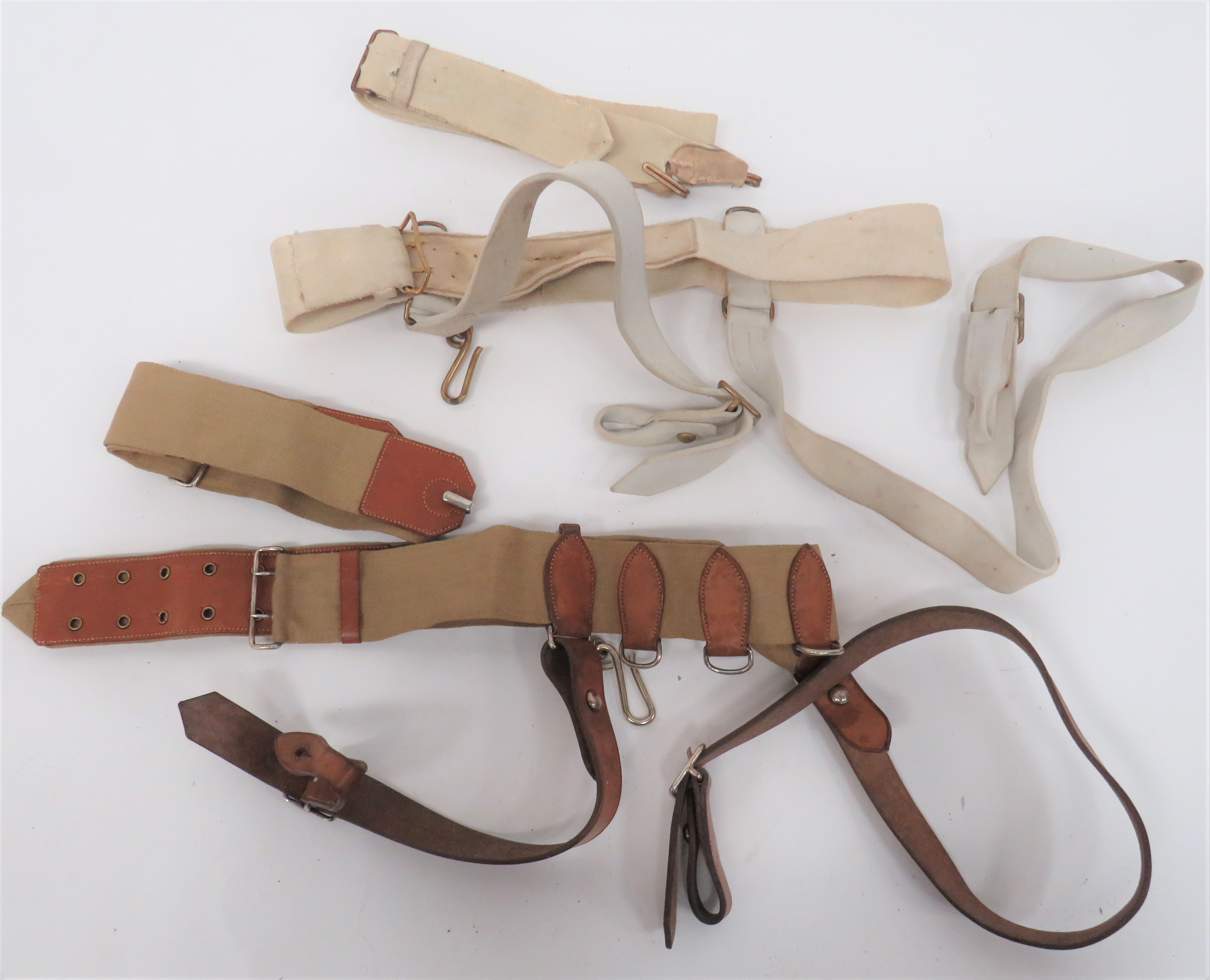 Two British Officer's Undress Sword Belts consisting white webbing belt with separate webbing