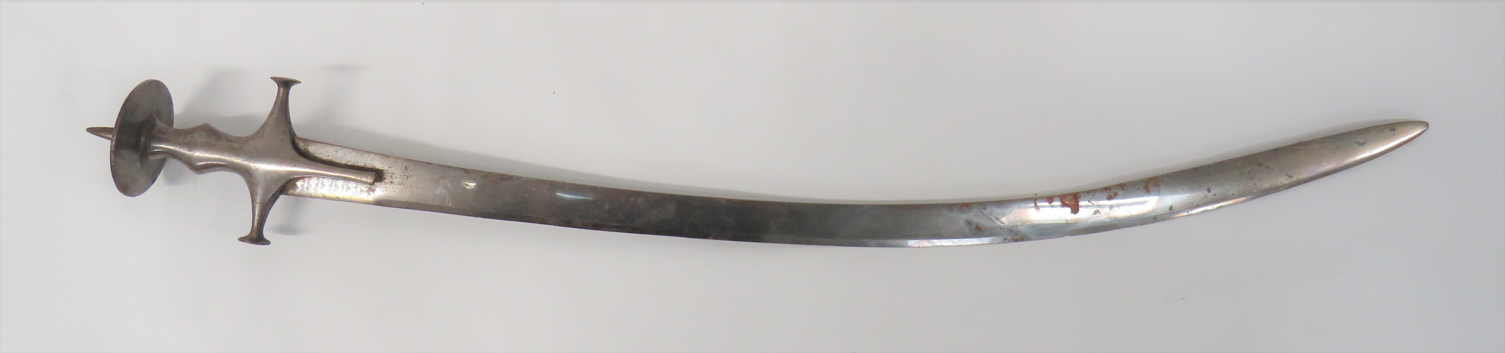 Fine Quality Early 19th Century Indian Tulwar 32 1/2 inch, single edged, curved blade.  The tip with