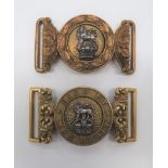 Two General List Officer's Belt Buckles consisting gilt circlet with laurel wreath.  Floral scroll