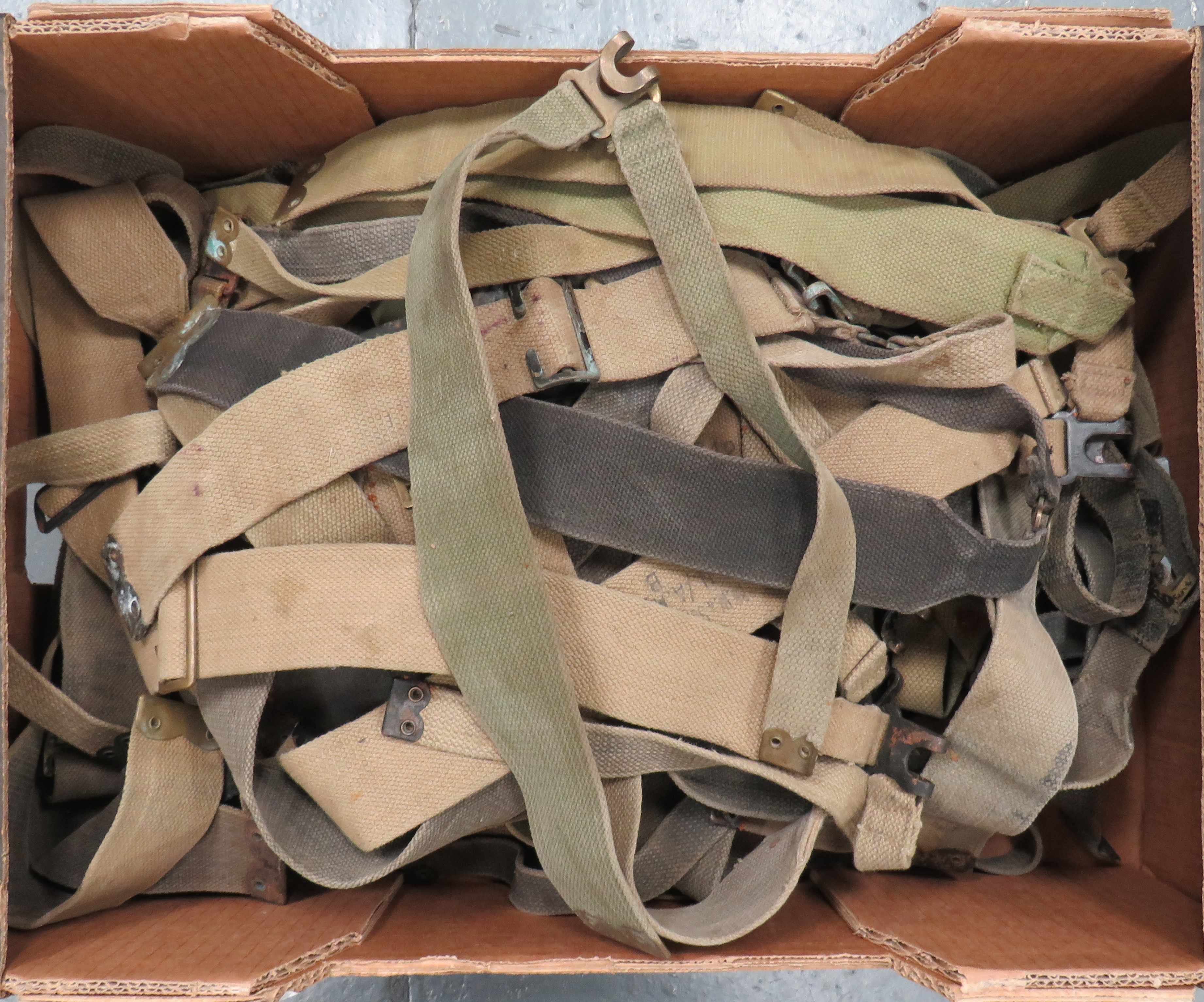 Quantity of 1937 ""L"" Pack Straps webbing ""L"" straps with brass or steel fittings.  Blancoed