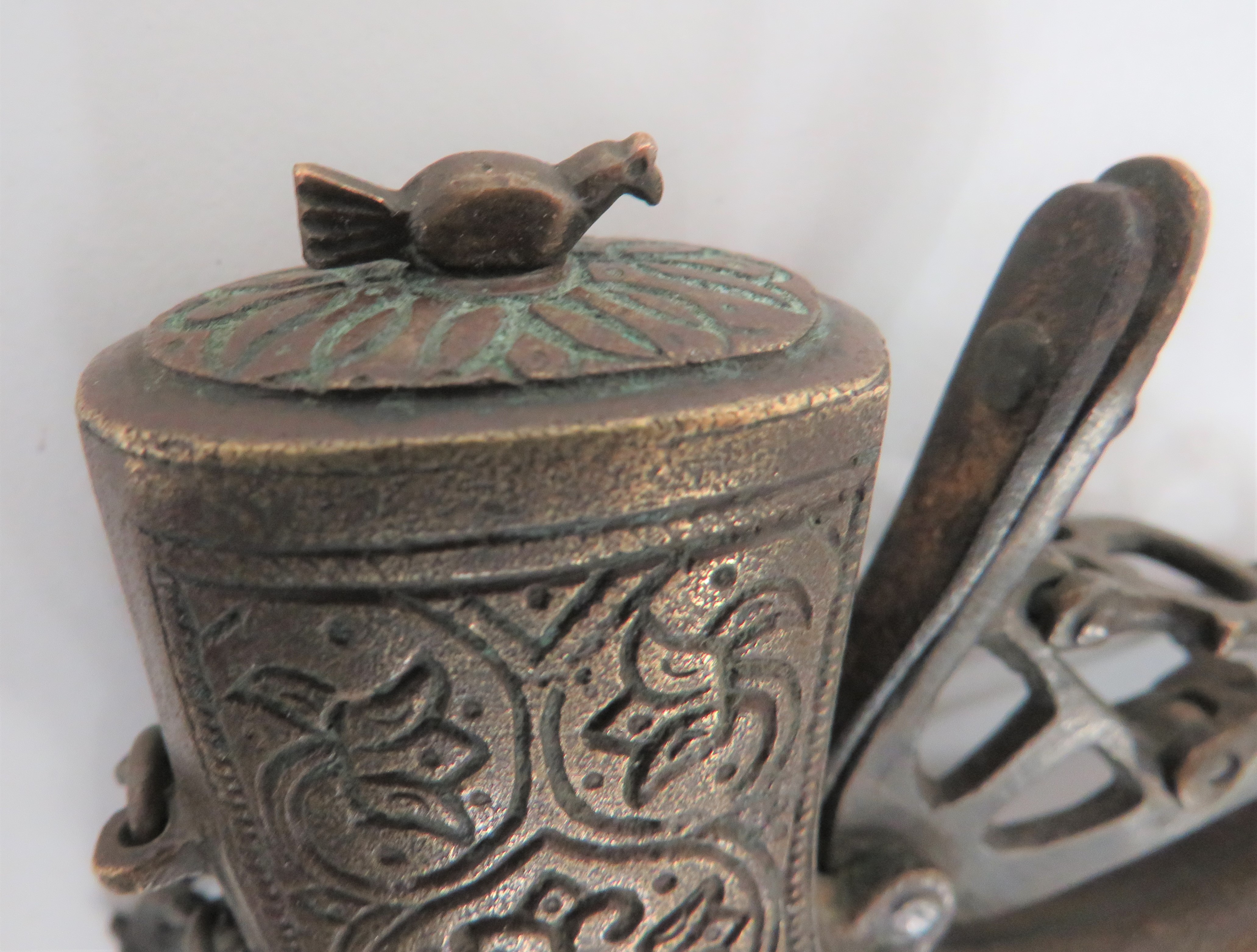 19th Century Indian Priming Flask heavily curved, small brass flask with engraved scroll foliage - Image 2 of 2