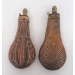 Two Victorian Powder Flasks consisting copper, bag shape flask with fluted design.  Brass top with