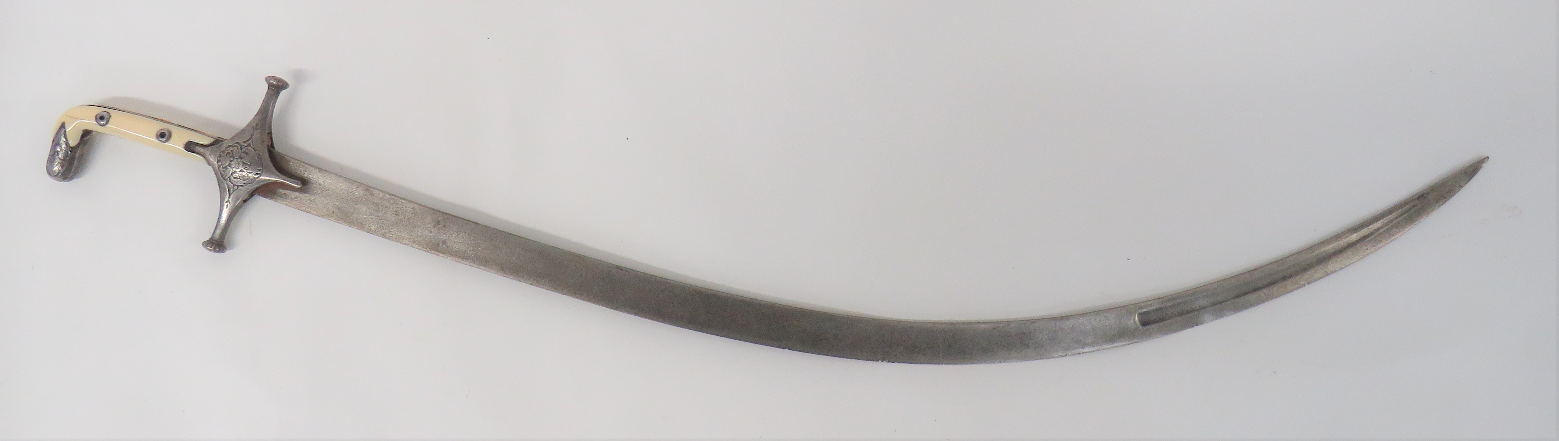 Late 18th Century Persian Shamshir  34 1/4 inch, single edged, heavily curved blade.  The point with