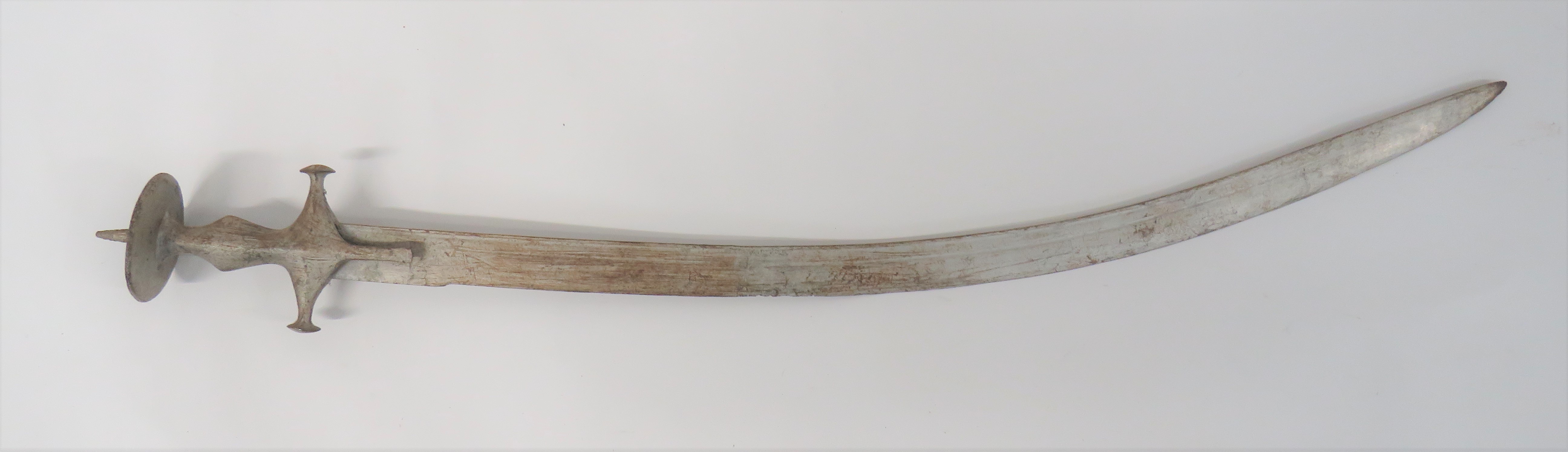 19th Century Indian Tulwar 29 1/4 inch, single edged, T section blade.  Single, narrow fuller.