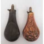 Two Victorian Powder Flasks consisting fluted, bag shape example.  The body with original darkened