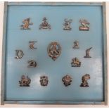 Various Silvered Livery Badges including armoured gauntlet holding sword ... Goat's head with