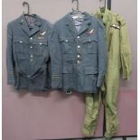 Two Royal Air Force Navigator Officer Service Tunics blue grey, single breasted, open collar tunic.