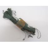 RAF Escape and Evasion Fishing Kit consisting green coloured fishing line, wire line/hook
